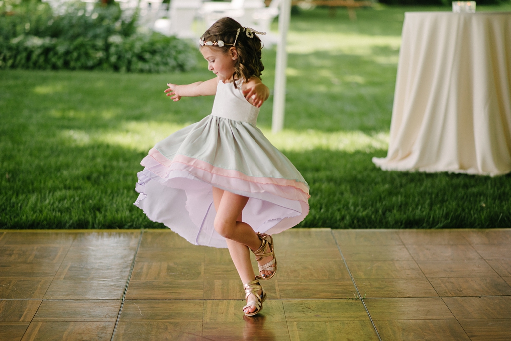flower girl twirling on dance floor