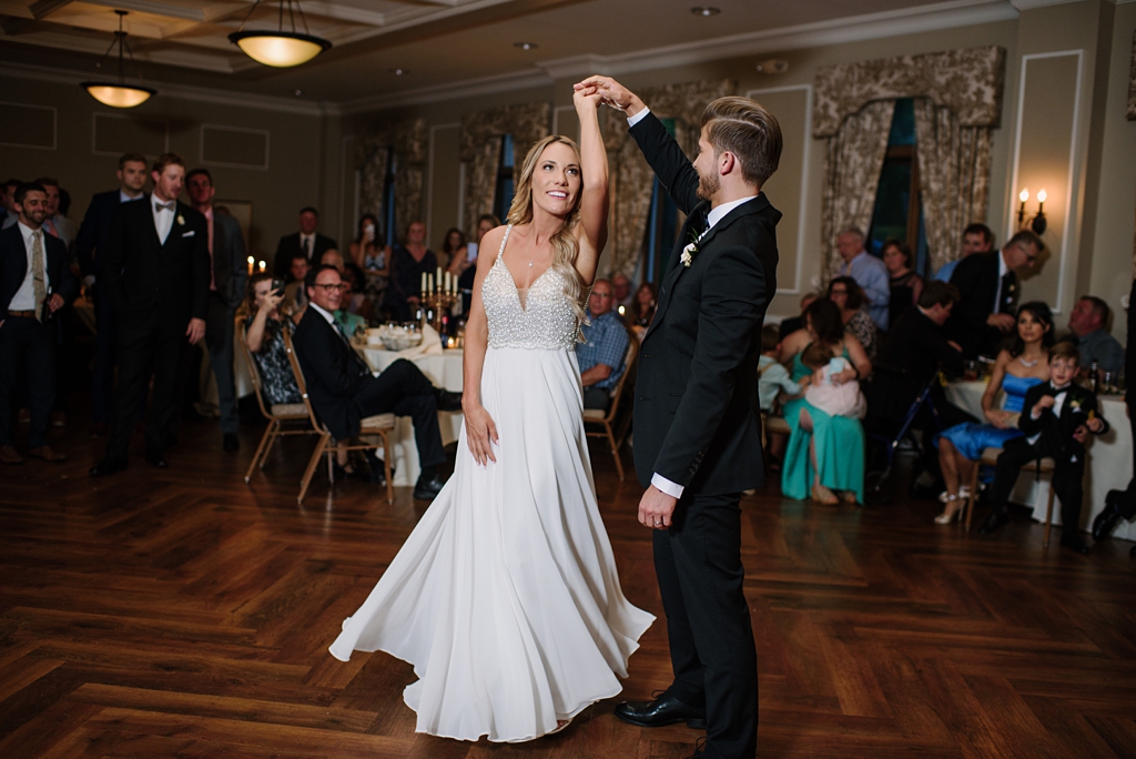 newlyweds share first dance at gale mansion event center