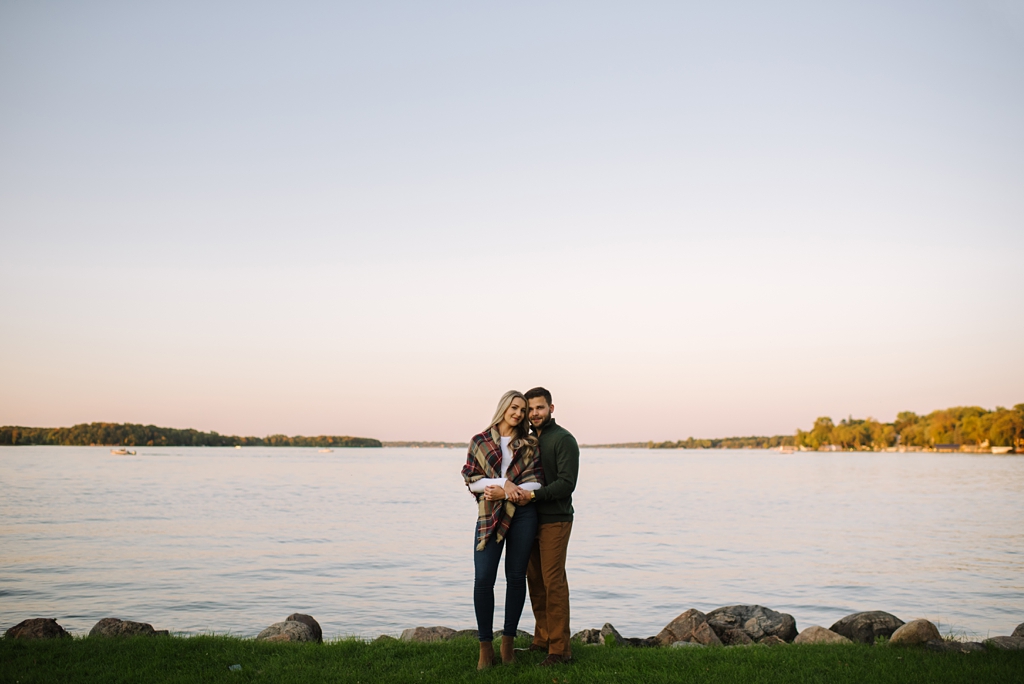 sunset fall engagement session beside excelsior bay