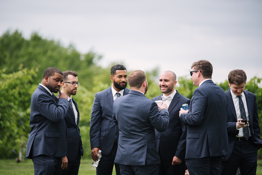 groom socializing with groomsmen