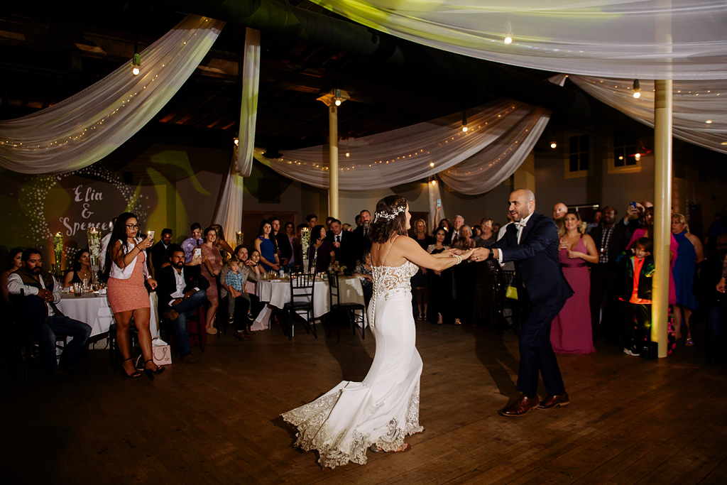 bride and groom share first dance at winery wedding reception