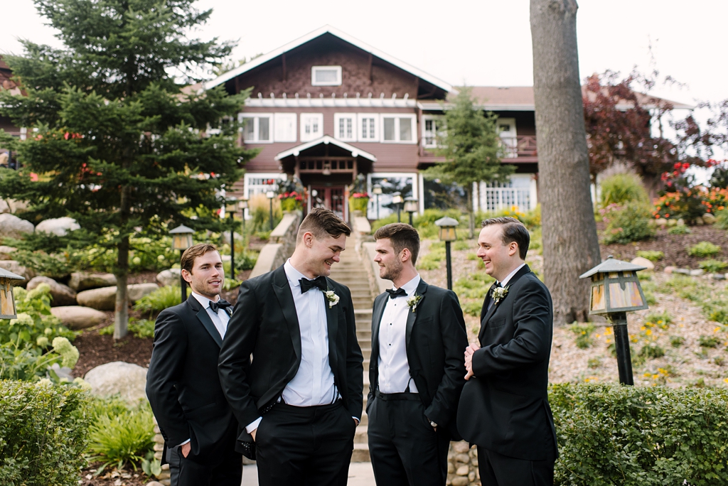 groom and groomsmen outside grand view lodge