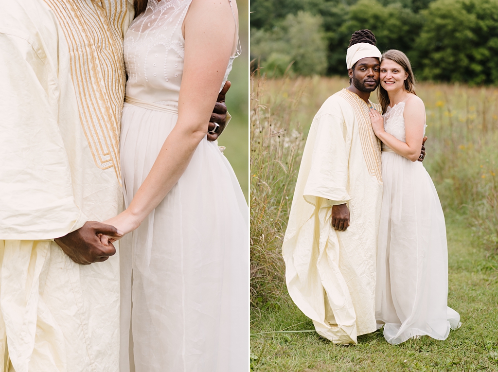 newlyweds embrace in prairie field after wedding