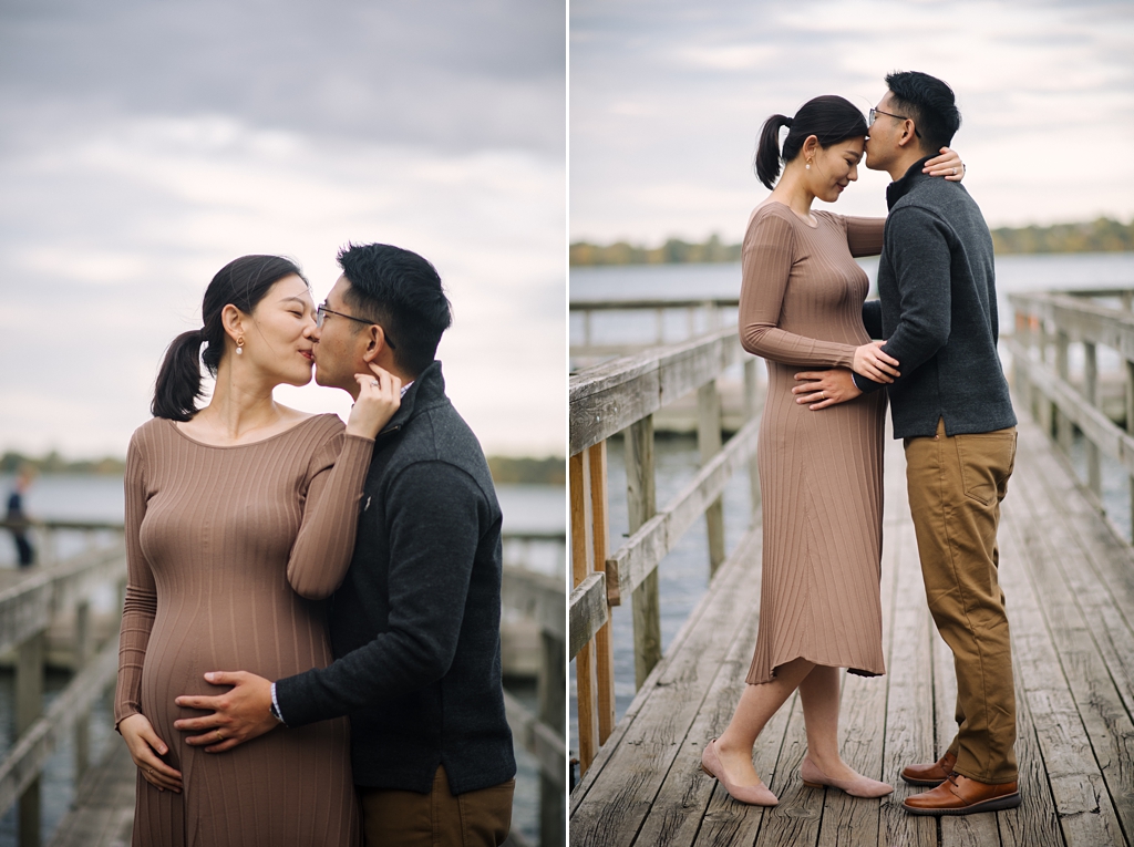couple celebrates pregnancy on lake dock in minneapolis