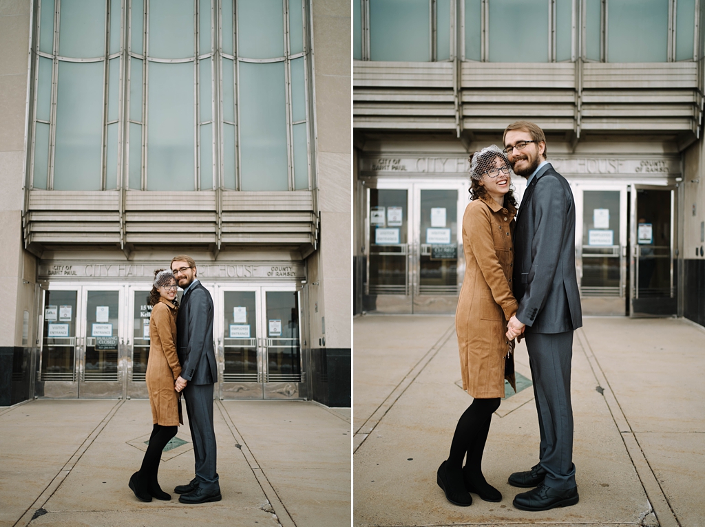 newly eloped couple in front of st paul courthouse