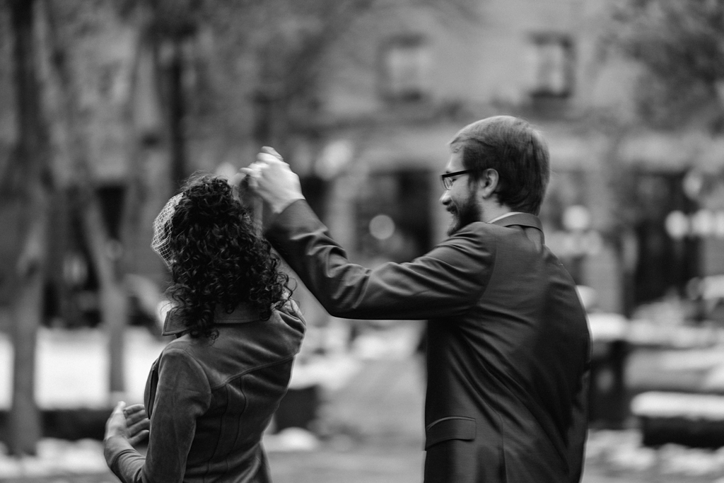 newly married couple dancing in minnesota streets