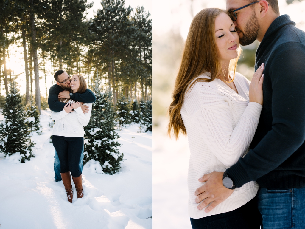 winter couple engagement session outside beneath trees
