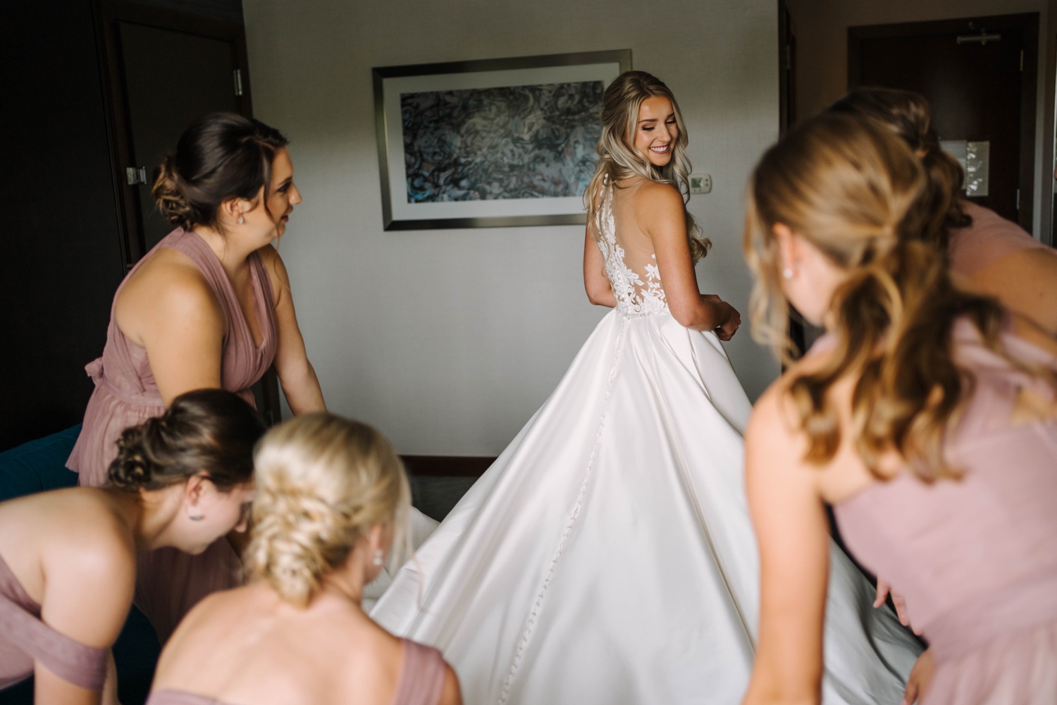 bride and bridesmaids getting ready for fall outdoor wedding
