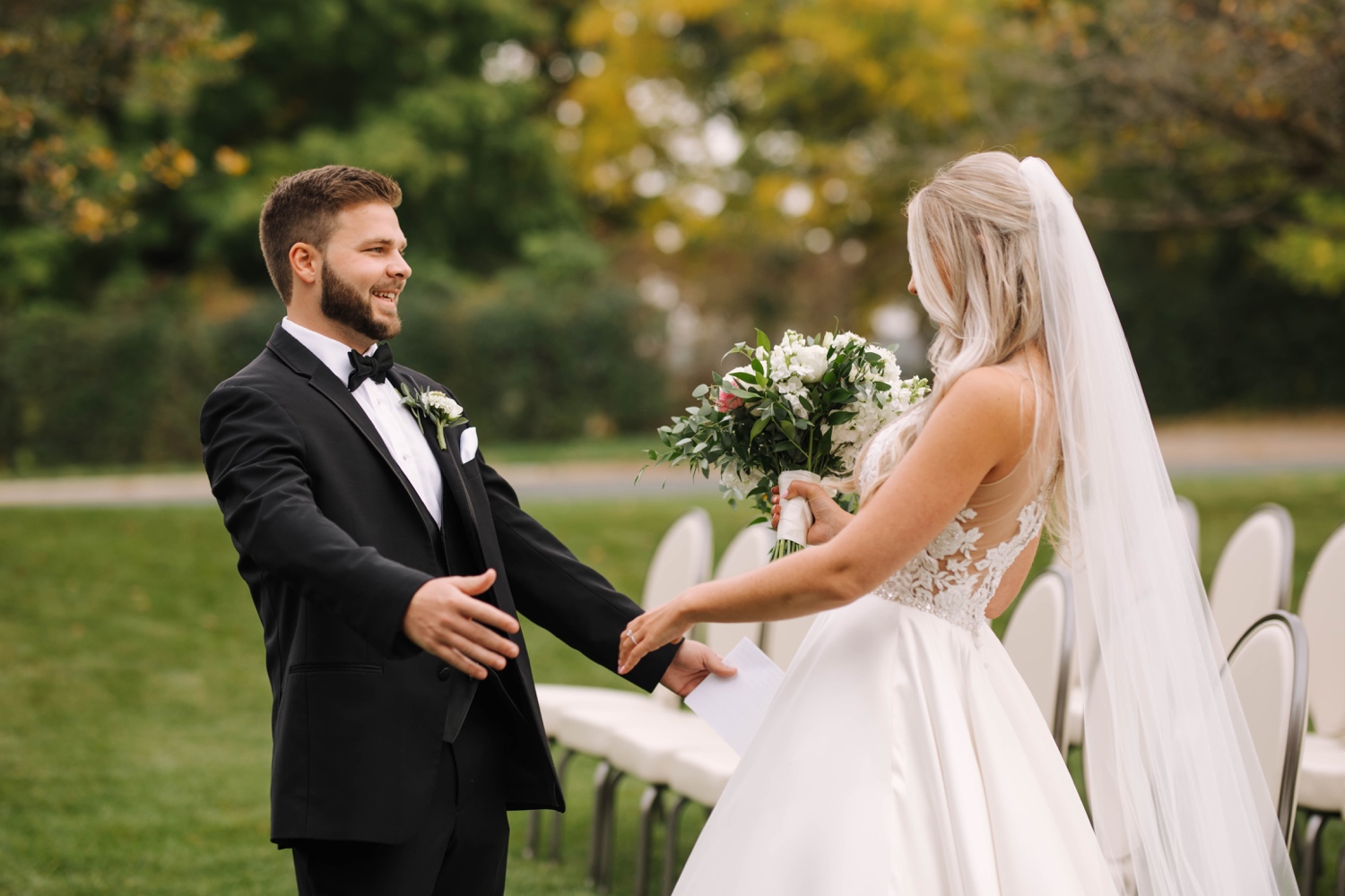 groom's first look at bride at outdoor fall wedding