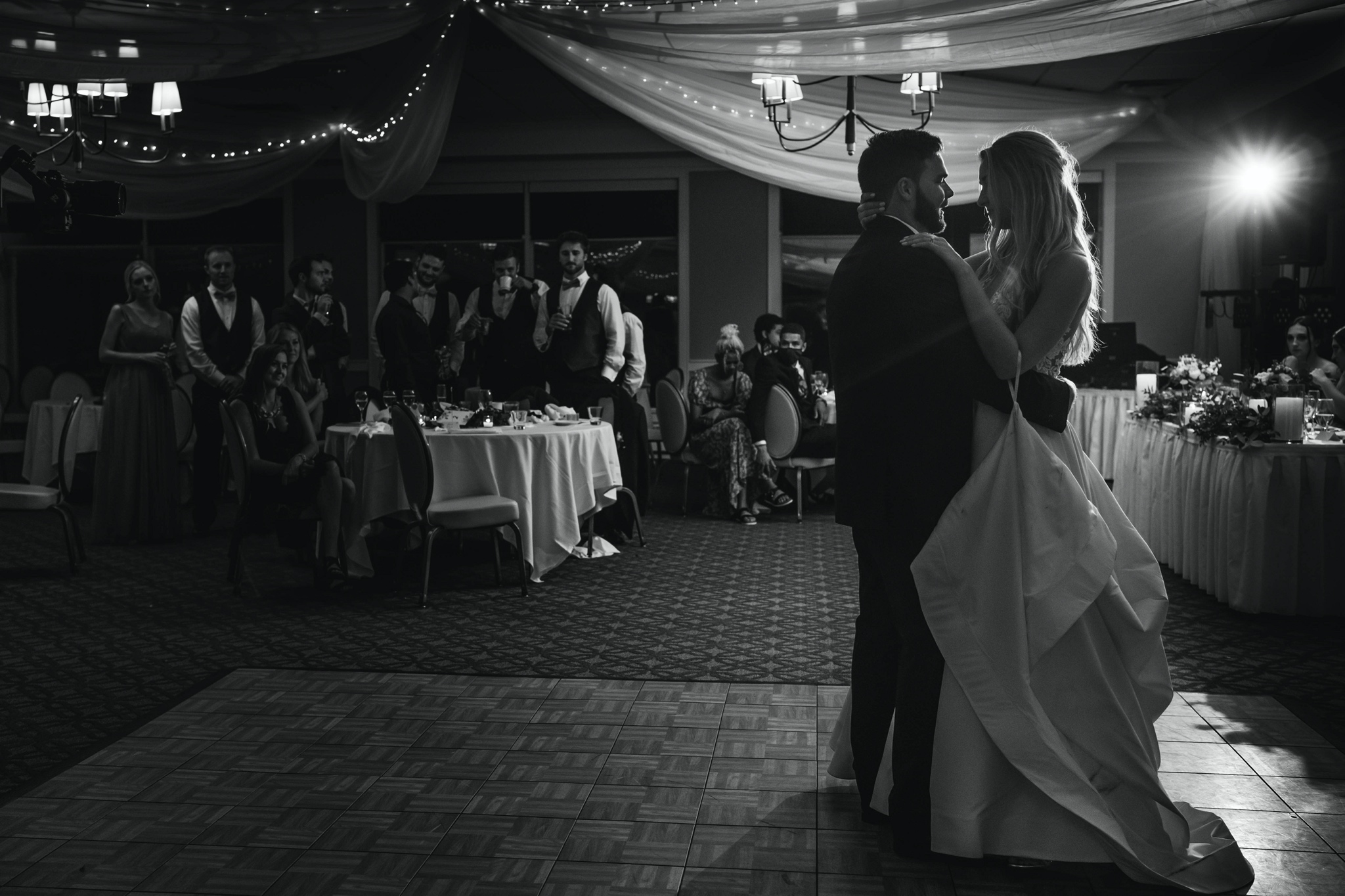 bride and groom share first dance after fall outdoor wedding
