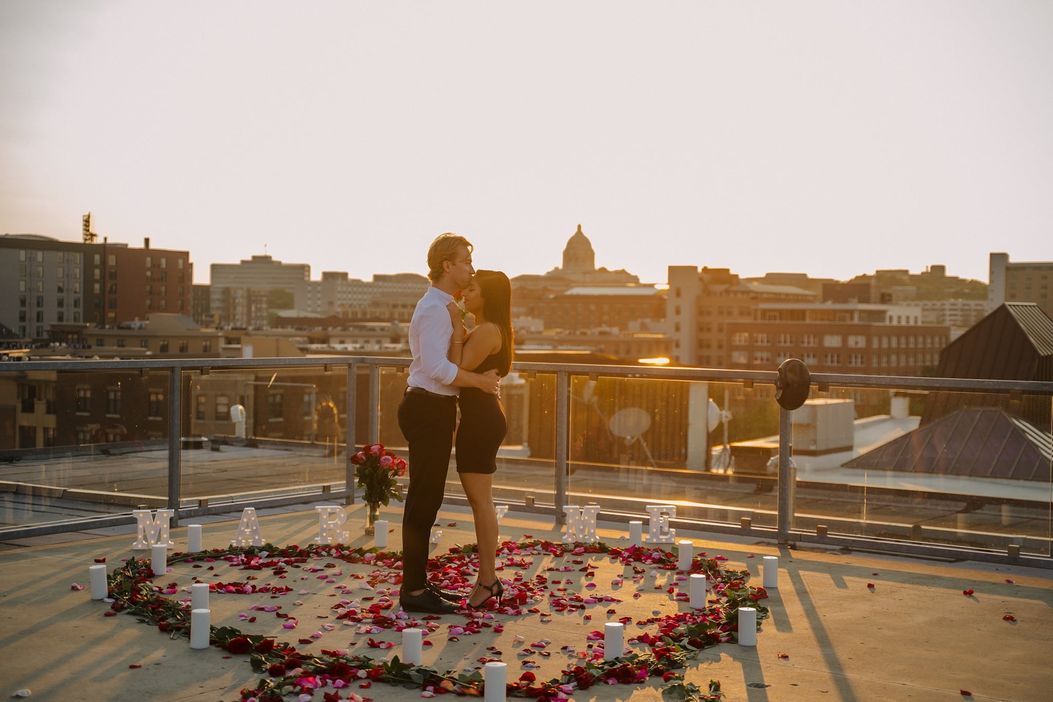 couple at sunset on saint paul rooftop