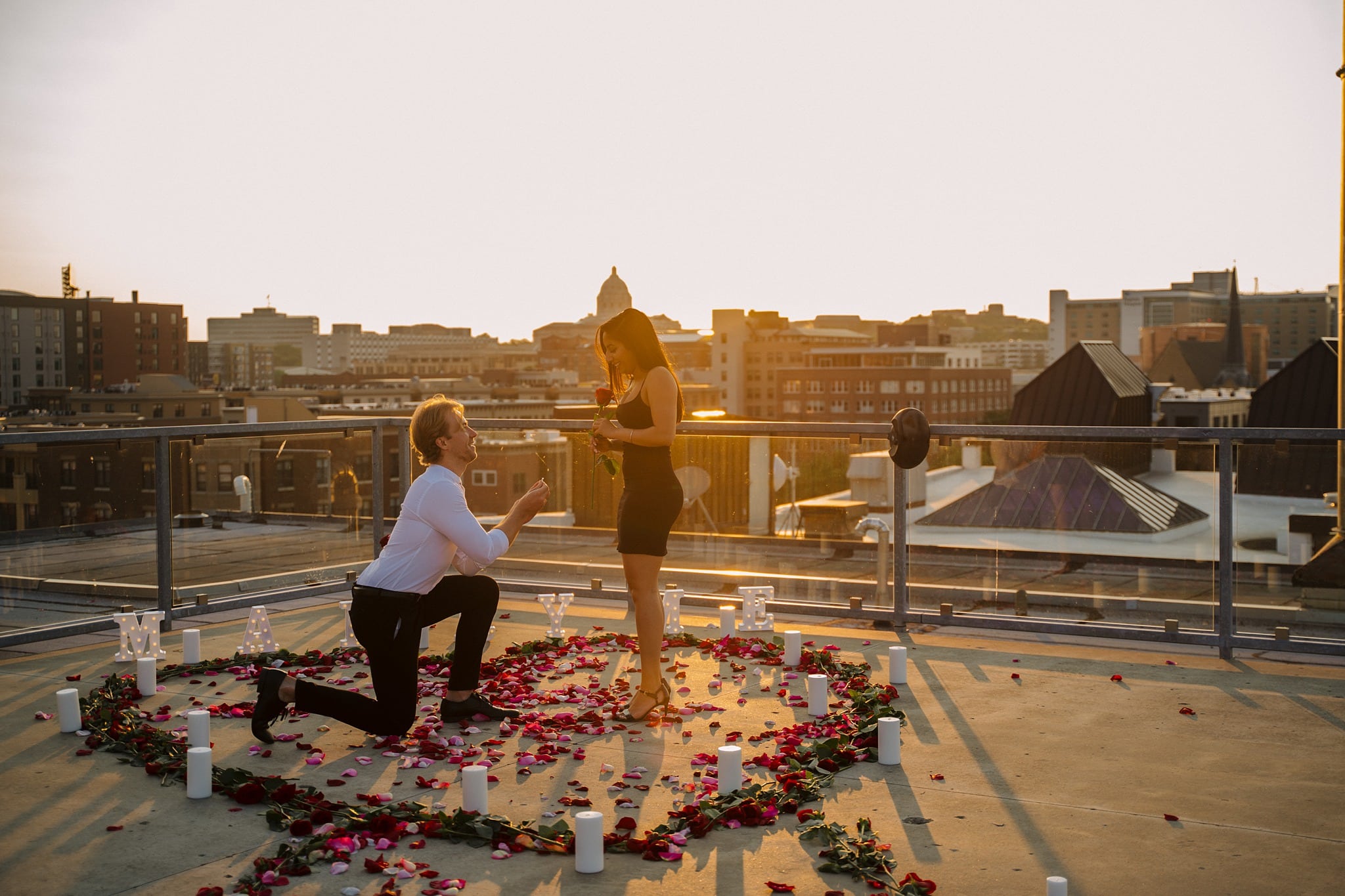 twin cities rooftop proposal with roses