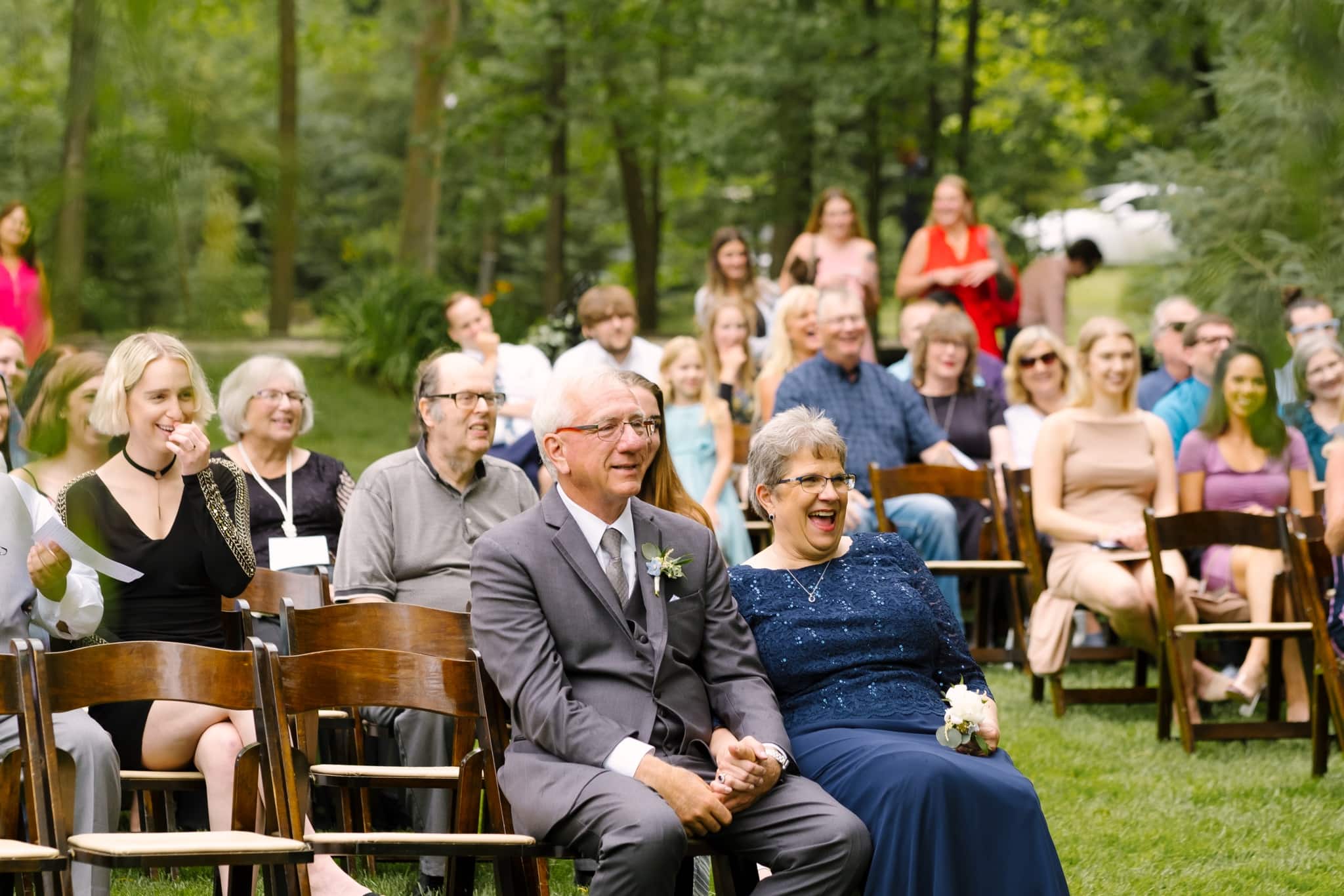 guests watching wedding at creekside farm