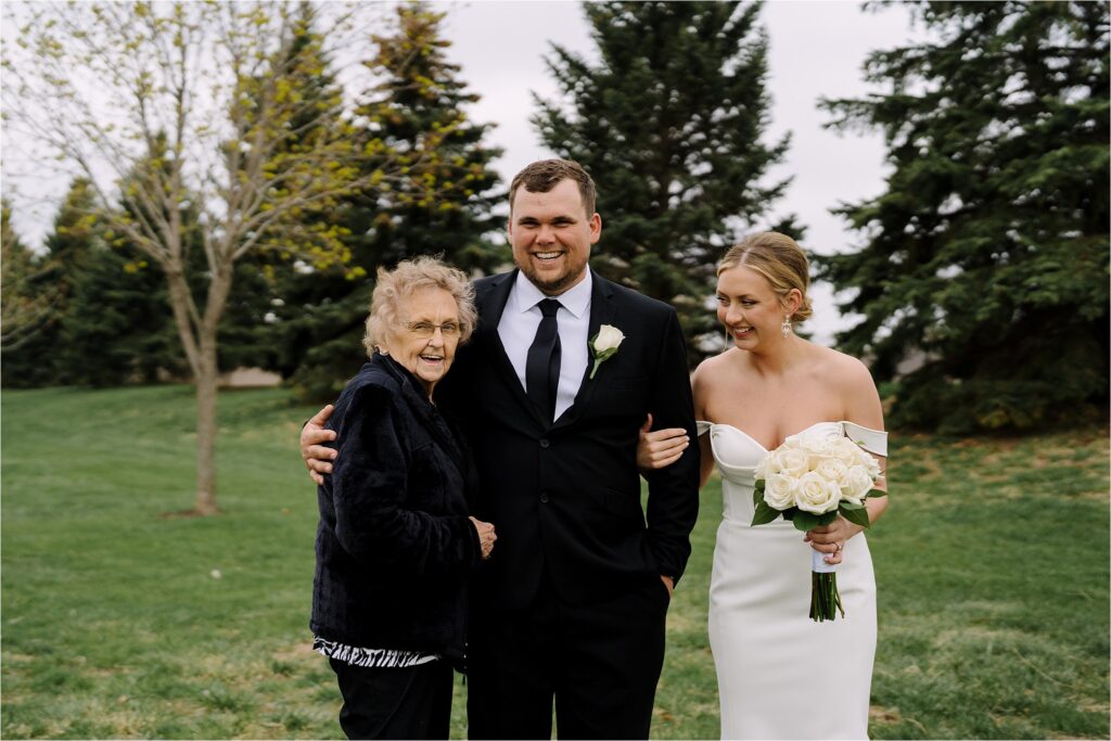Bride and groom with grandma at minneapolis wedding
